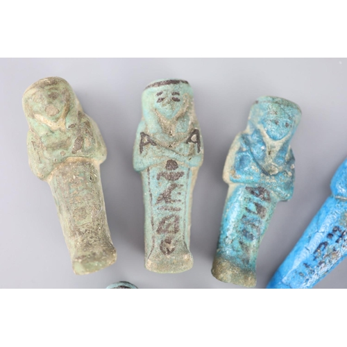 10 - Five Egyptian turquoise glazed faience shabti and three fragments, New Kingdom to late period, some ... 