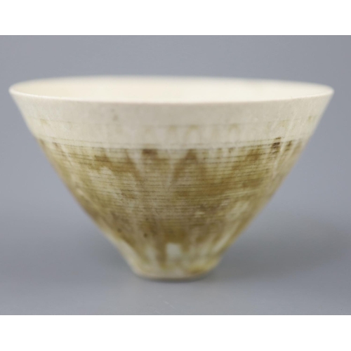 105 - Dame Lucie Rie (1902-1995). A finely potted conical bowl, in white stoneware, the ring turning to th... 