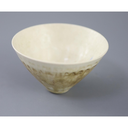 105 - Dame Lucie Rie (1902-1995). A finely potted conical bowl, in white stoneware, the ring turning to th... 