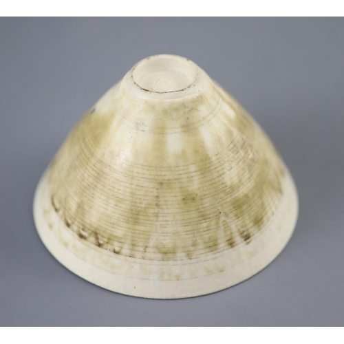 105 - Dame Lucie Rie (1902-1995). A finely potted conical bowl, in white stoneware, the ring turning to th... 