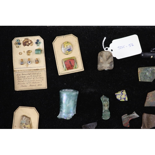 11 - A group of three Roman glass vessels and Egyptian/Roman glass fragments, many with old collection la... 