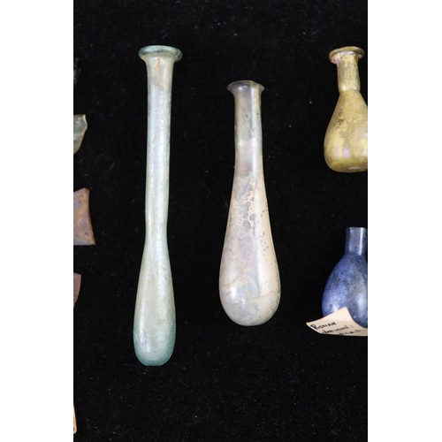 11 - A group of three Roman glass vessels and Egyptian/Roman glass fragments, many with old collection la... 