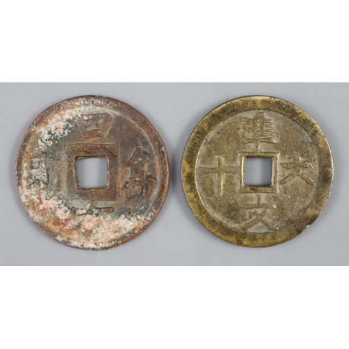 127 - Vietnam coins, Annam. Tu-Duc (1848-1883), two brass or copper 60-Van type coins, Schroeder 309, 42mm... 