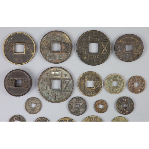 129 - China, a group of 6 bronze coin charms or amulets, 19th century and various Thai (Siamese) porcelain... 