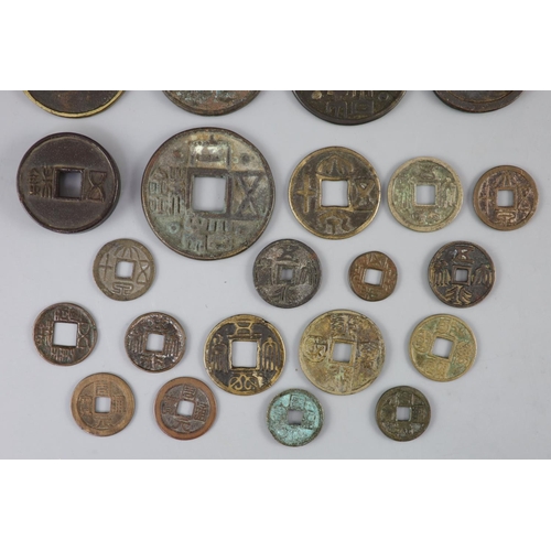 129 - China, a group of 6 bronze coin charms or amulets, 19th century and various Thai (Siamese) porcelain... 