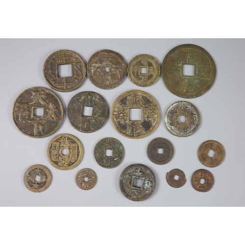 135 - China, a group of 17 bronze or copper inscribed charms or amulets, Qing dynasty, nine with inscripti... 