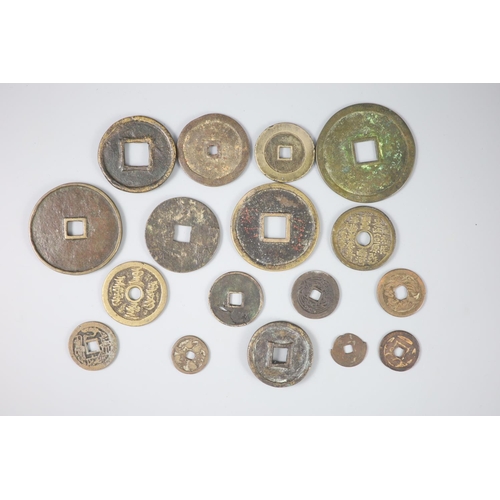 135 - China, a group of 17 bronze or copper inscribed charms or amulets, Qing dynasty, nine with inscripti... 