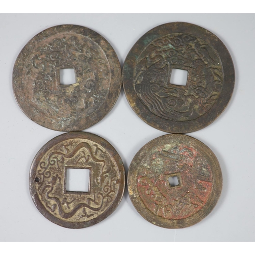 140 - China, 4 bronze or copper charms or amulets, Qing dynasty, each with four character inscription obve... 