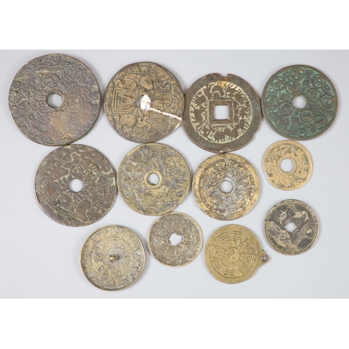 143 - China, 12 bronze charms or amulets, Qing dynasty, to include eight zodiac charms, rev. pictorial, Ma... 