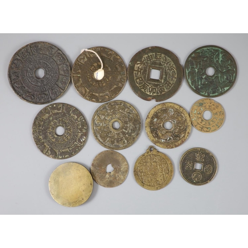 143 - China, 12 bronze charms or amulets, Qing dynasty, to include eight zodiac charms, rev. pictorial, Ma... 