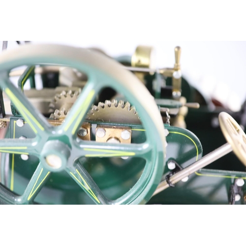 15 - A Maxwell Hemmens Precision Steam Models agricultural traction engine, with green and red paintwork,... 