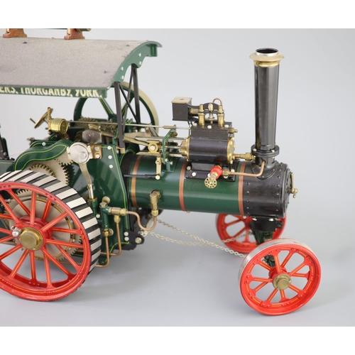 15 - A Maxwell Hemmens Precision Steam Models agricultural traction engine, with green and red paintwork,... 