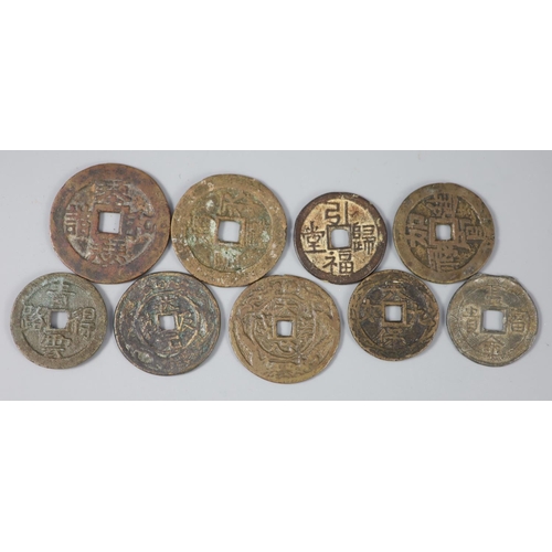 151 - China, 9 bronze or copper charms or amulets, Qing dynasty, each inscribed with four characters to bo... 