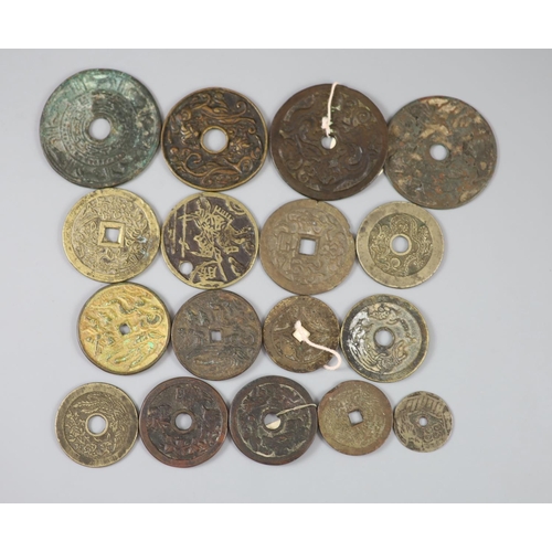 159 - China, 17 bronze or copper charms or amulets, Qing dynasty or earlier, fifteen with pictorial obvers... 