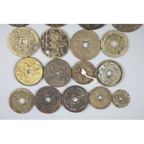 159 - China, 17 bronze or copper charms or amulets, Qing dynasty or earlier, fifteen with pictorial obvers... 