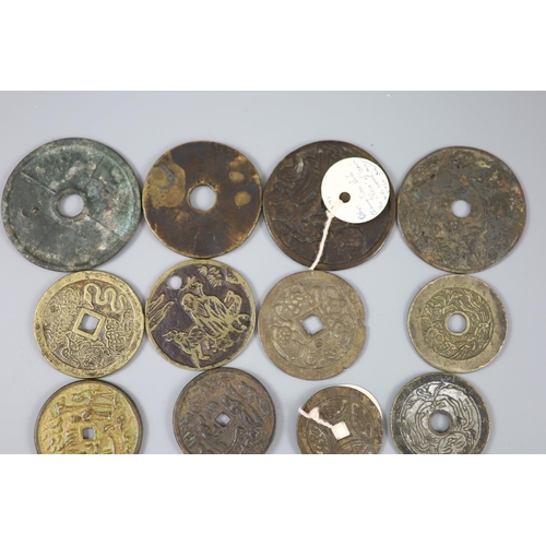 159 - China, 17 bronze or copper charms or amulets, Qing dynasty or earlier, fifteen with pictorial obvers... 