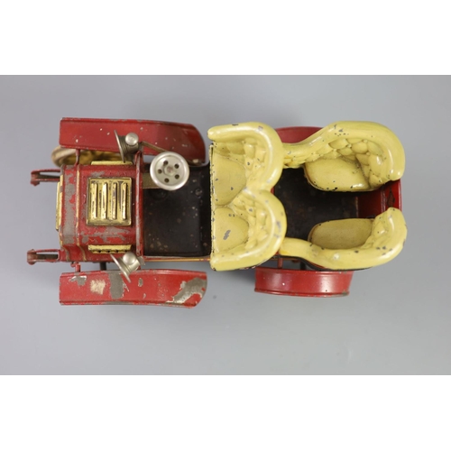 16 - A Bing clockwork tinplate car, c.1906, with cream painted seats, red bodywork and yellow wheels, len... 