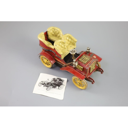 16 - A Bing clockwork tinplate car, c.1906, with cream painted seats, red bodywork and yellow wheels, len... 