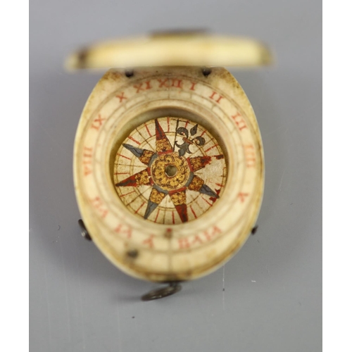 17 - A rare late 16th century German oval ivory diptych-dial, the upper inner leaf with tangent circles a... 