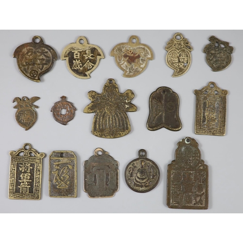 174 - China, 15 bronze pendant charms or amulets, Qing dynasty, 31-76mm, ranging from F to VF, seven peach... 