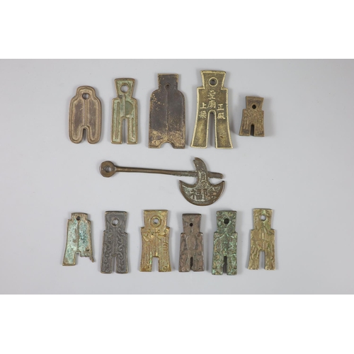 179 - China, 11 bronze spade shaped charms or amulets, Qing dynasty, 31-61mm, F to VF, together with a Gre... 