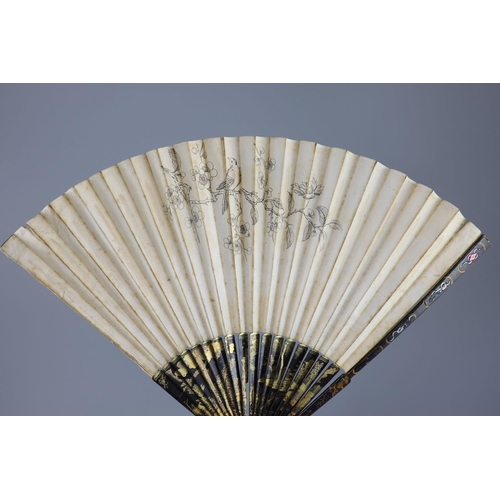 18 - An English painted paper and 'lacquer' fan, late 18th century and a 19th century Chinese embroidered... 