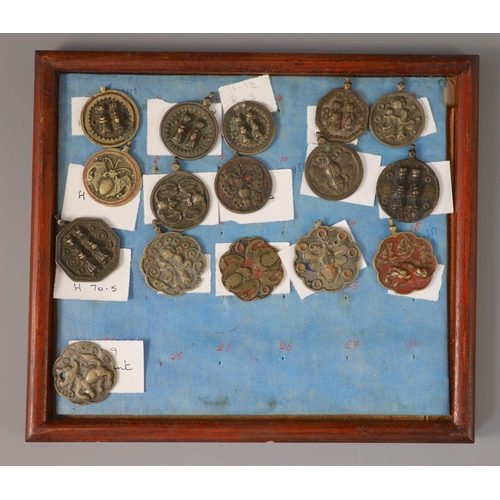 185 - A group of 99 Korean bronze and metal amulets or charms, 19th/20th century largest 70mmCONDITION: tr... 