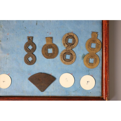 185 - A group of 99 Korean bronze and metal amulets or charms, 19th/20th century largest 70mmCONDITION: tr... 