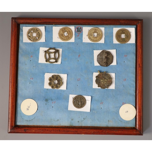 185 - A group of 99 Korean bronze and metal amulets or charms, 19th/20th century largest 70mmCONDITION: tr... 