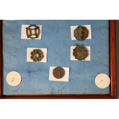 185 - A group of 99 Korean bronze and metal amulets or charms, 19th/20th century largest 70mmCONDITION: tr... 