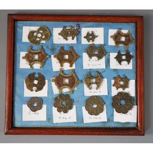 185 - A group of 99 Korean bronze and metal amulets or charms, 19th/20th century largest 70mmCONDITION: tr... 