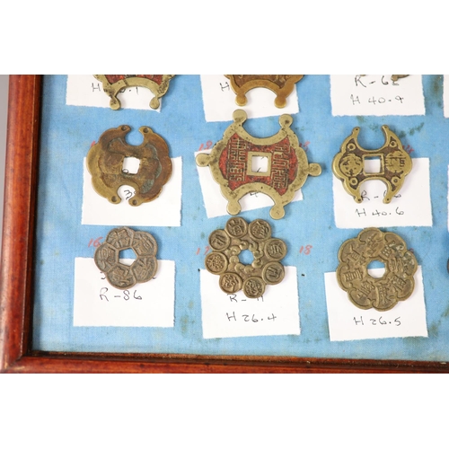 185 - A group of 99 Korean bronze and metal amulets or charms, 19th/20th century largest 70mmCONDITION: tr... 