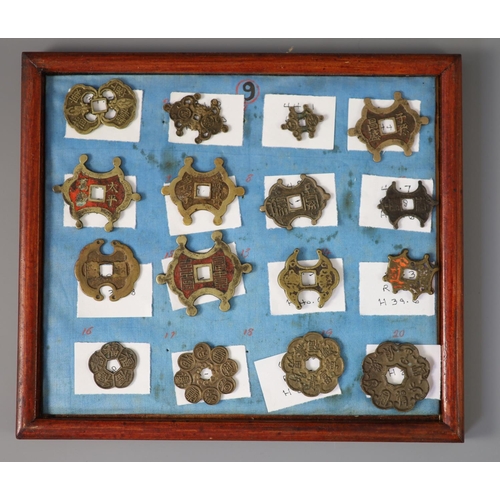 185 - A group of 99 Korean bronze and metal amulets or charms, 19th/20th century largest 70mmCONDITION: tr... 