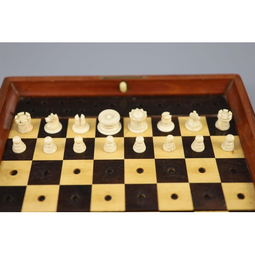 19 - A Jaques & Son Ltd In Statu Quo bone travelling chess set, in mahogany case, c.1860, with brass labe... 