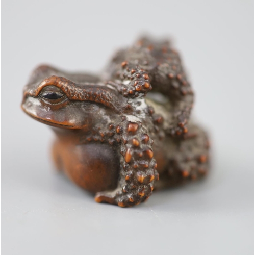 201 - A fine Japanese wood okimono of toads, signed Masanao, 19th century, with black horn inset eyes, eng... 