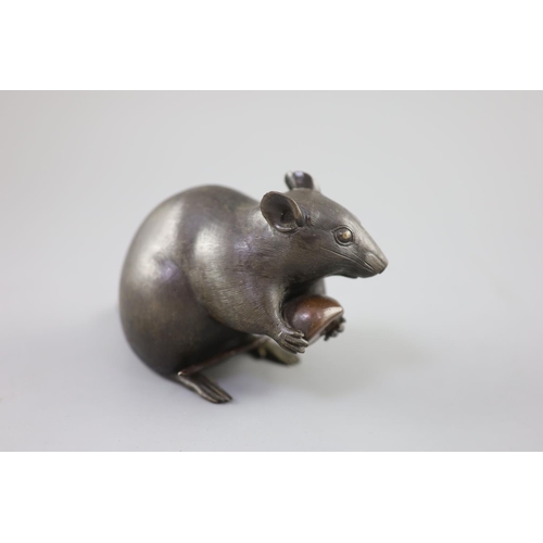 202 - A Japanese bronze model of a rat holding a chestnut, Meiji period, incised Kakihan mark to base, 17c... 