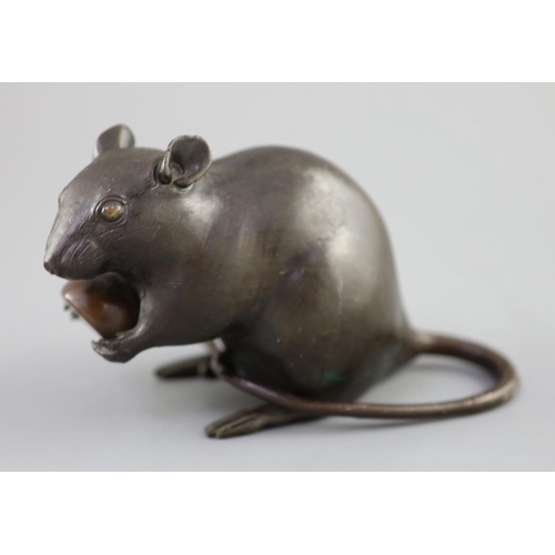 202 - A Japanese bronze model of a rat holding a chestnut, Meiji period, incised Kakihan mark to base, 17c... 