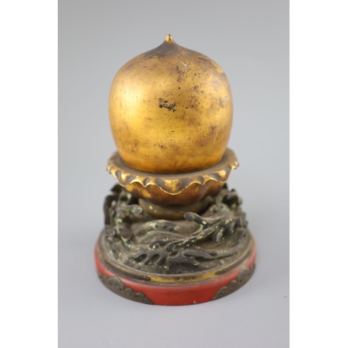 204 - A Japanese lacquer portable shrine (zushi), 19th century, of peach form opening to reveal a female i... 