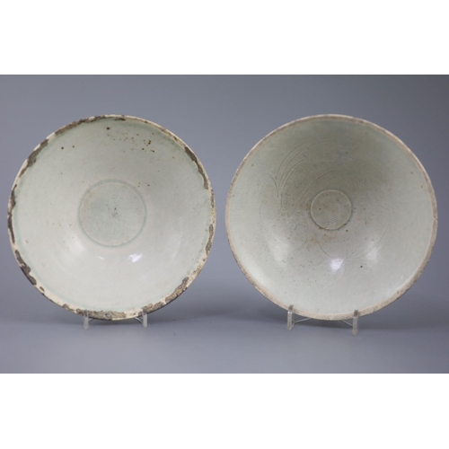 213 - Two Chinese Qingbai bowls, Song dynasty, the first incised with foliage to the interior, the second ... 