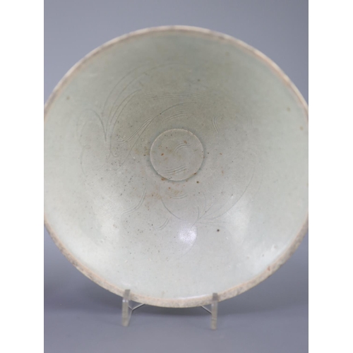 213 - Two Chinese Qingbai bowls, Song dynasty, the first incised with foliage to the interior, the second ... 