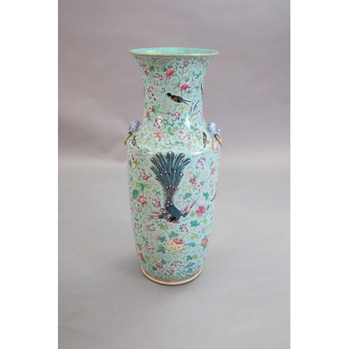 220 - A large Chinese famille rose turquoise ground baluster vase, first half 19th century, painted with v... 