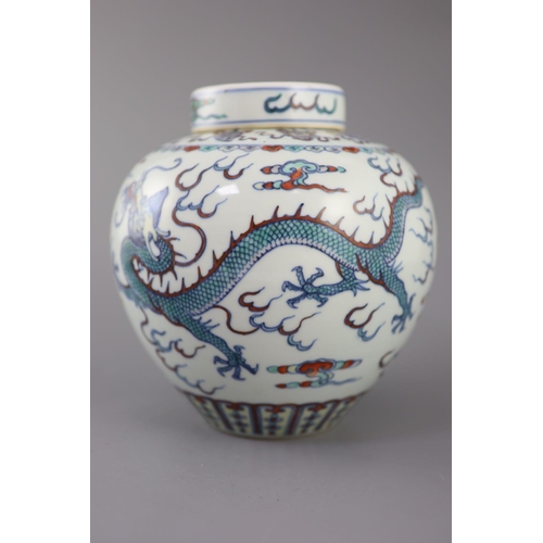 221 - A Chinese doucai 'dragon' jar and cover, Qianlong seal mark, late 19th/early 20th century, the ovoid... 