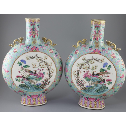 227 - A pair of large Chinese turquoise ground famille rose moon flasks, Tongzhi seal mark and of the peri... 