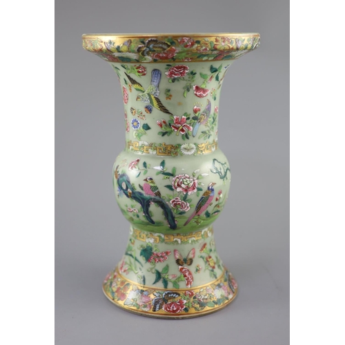 231 - A Chinese Canton decorated celadon ground vase, zun, c.1830, painted in famille rose colours with bi... 