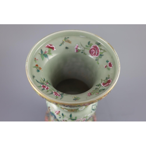 231 - A Chinese Canton decorated celadon ground vase, zun, c.1830, painted in famille rose colours with bi... 