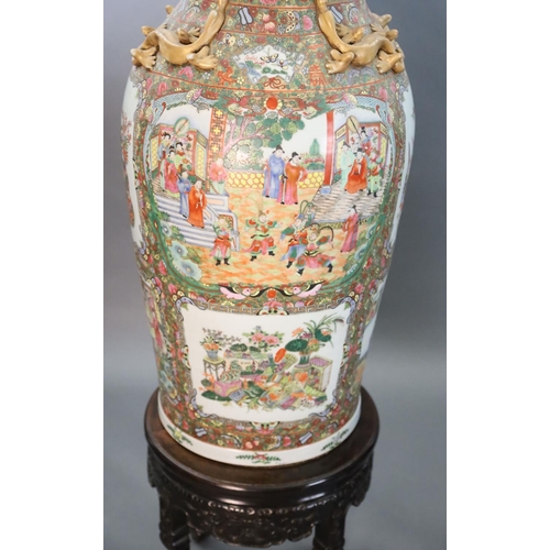 234 - A pair of massive Chinese Canton style famille rose vases, 20th century and a pair of Chinese hongmu... 