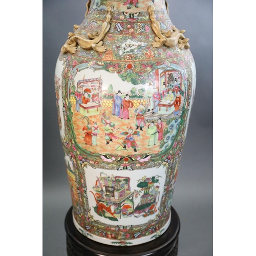 234 - A pair of massive Chinese Canton style famille rose vases, 20th century and a pair of Chinese hongmu... 