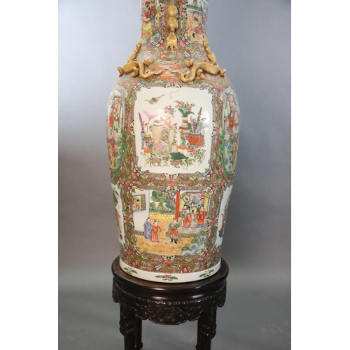 234 - A pair of massive Chinese Canton style famille rose vases, 20th century and a pair of Chinese hongmu... 