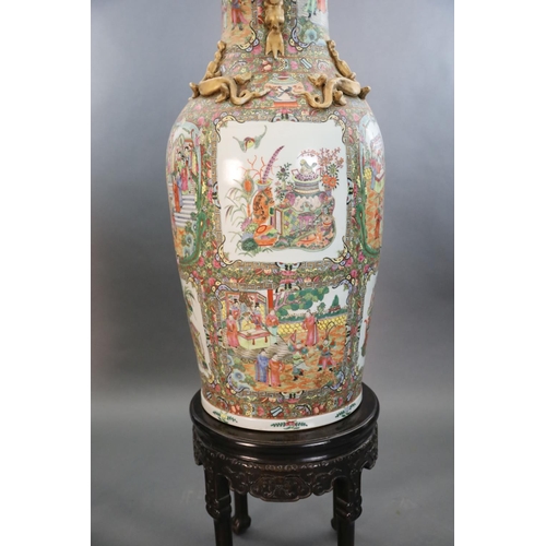 234 - A pair of massive Chinese Canton style famille rose vases, 20th century and a pair of Chinese hongmu... 