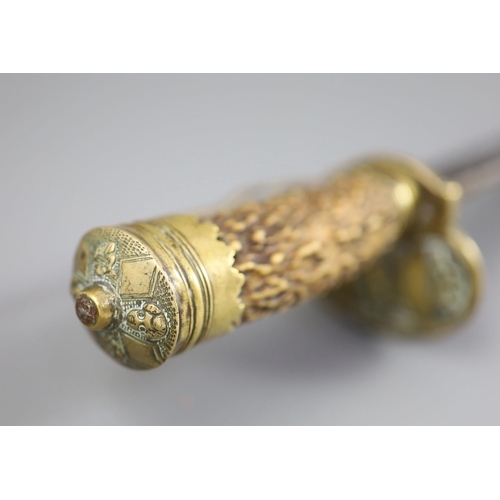 24 - A late 17th century military hangar sword, with brass hilt, antler handle and blade engraved with cl... 